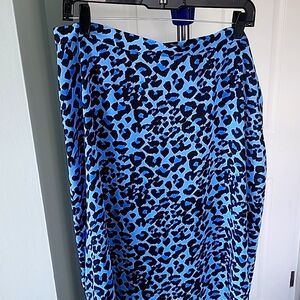 SKIRT..mid length. Lined half way. Splits on both sides
